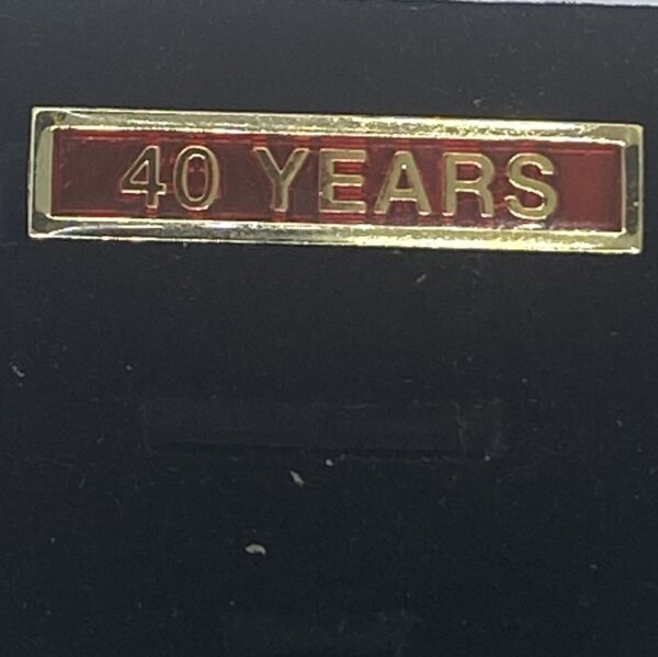 Victoria Ambulance Long Service Clasp (translucent red)