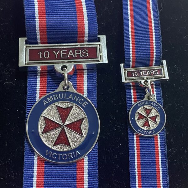 Victoria Ambulance 10 Year Long Service Clasp (translucent red on Silver)